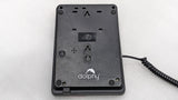 Back of the Dolphy black telephone showing the wall-mount keyholes