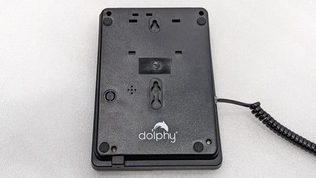 Back of the Dolphy black telephone showing the wall-mount keyholes