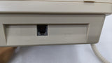 Line socket on the back of the Dolphy beige hotel telephone