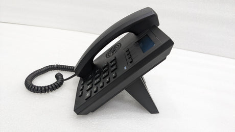 Dolphy corded telephone on its angled stand, side view