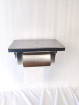 Dolphy stainless steel toilet roll holder with shelf, front view with a roll fitted
