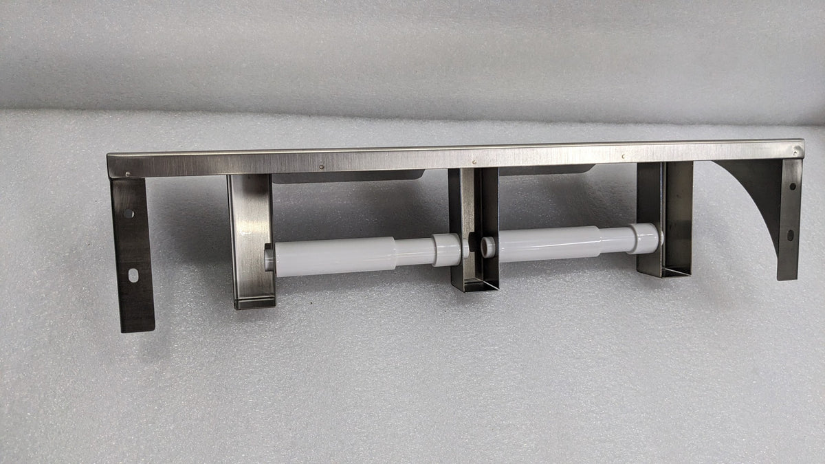 Dolphy twin toilet roll holder with covers removed, showing the two spring spindles