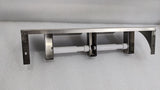 Dolphy twin toilet roll holder with covers removed, showing the two spring spindles