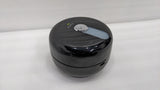Dolphy black round centre-pull toilet paper dispenser, angled view