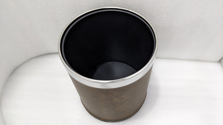 Dolphy brown room bin from above, showing the steel rim and inner liner
