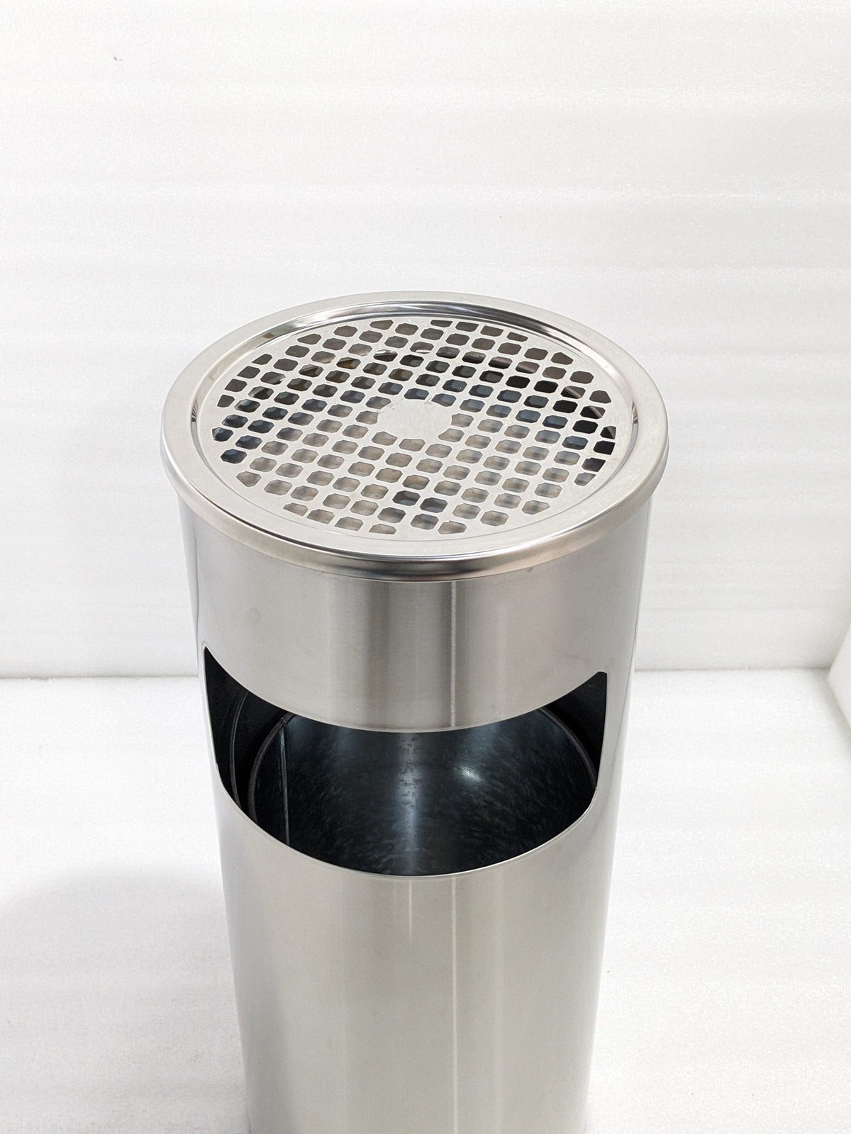 Dolphy 10L stainless steel ashtray bin, top view of the ash grille and waste opening
