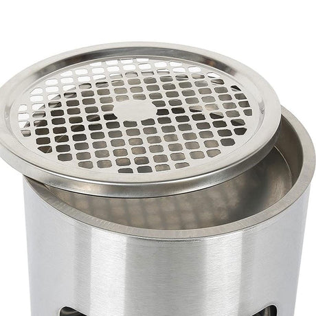 Close-up of the Dolphy ashtray bin's perforated stainless steel ash grille lifted off the top tray