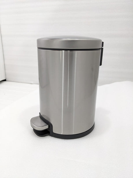 Dolphy 6L round stainless steel pedal bin, front view with foot pedal