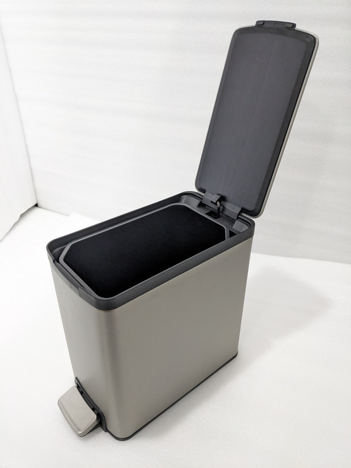Dolphy 8L slim stainless steel pedal bin with the lid open, showing the inner bucket