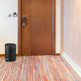 Dolphy 5L black pedal bin beside a hotel room door