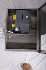 Dolphy recessed hand dryer with the front panel open, showing the dryer unit inside