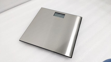 Dolphy silver digital bathroom scale with brushed stainless steel top and LCD display