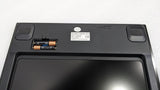 Underside of the Dolphy digital scale showing the battery compartment and non-slip feet
