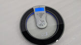 Dolphy round glass bathroom scale from above with the display lit