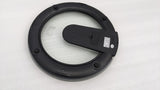 Underside of the Dolphy round glass scale showing the battery cover and feet