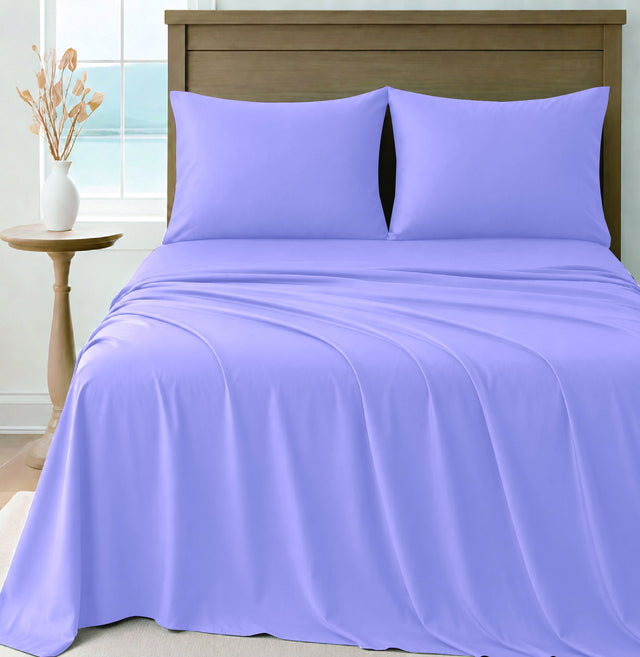 LinenCart lavender brushed microfibre sheet set on a made bed