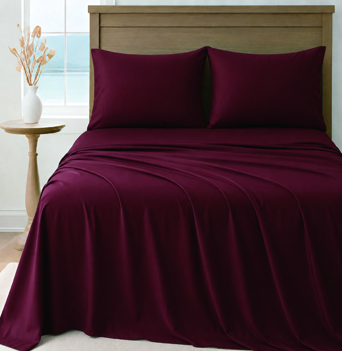 LinenCart maroon brushed microfibre sheet set on a made bed