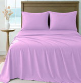 LinenCart pink brushed microfibre sheet set on a made bed